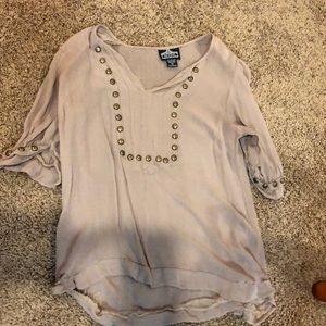 Tan blouse but has defects
